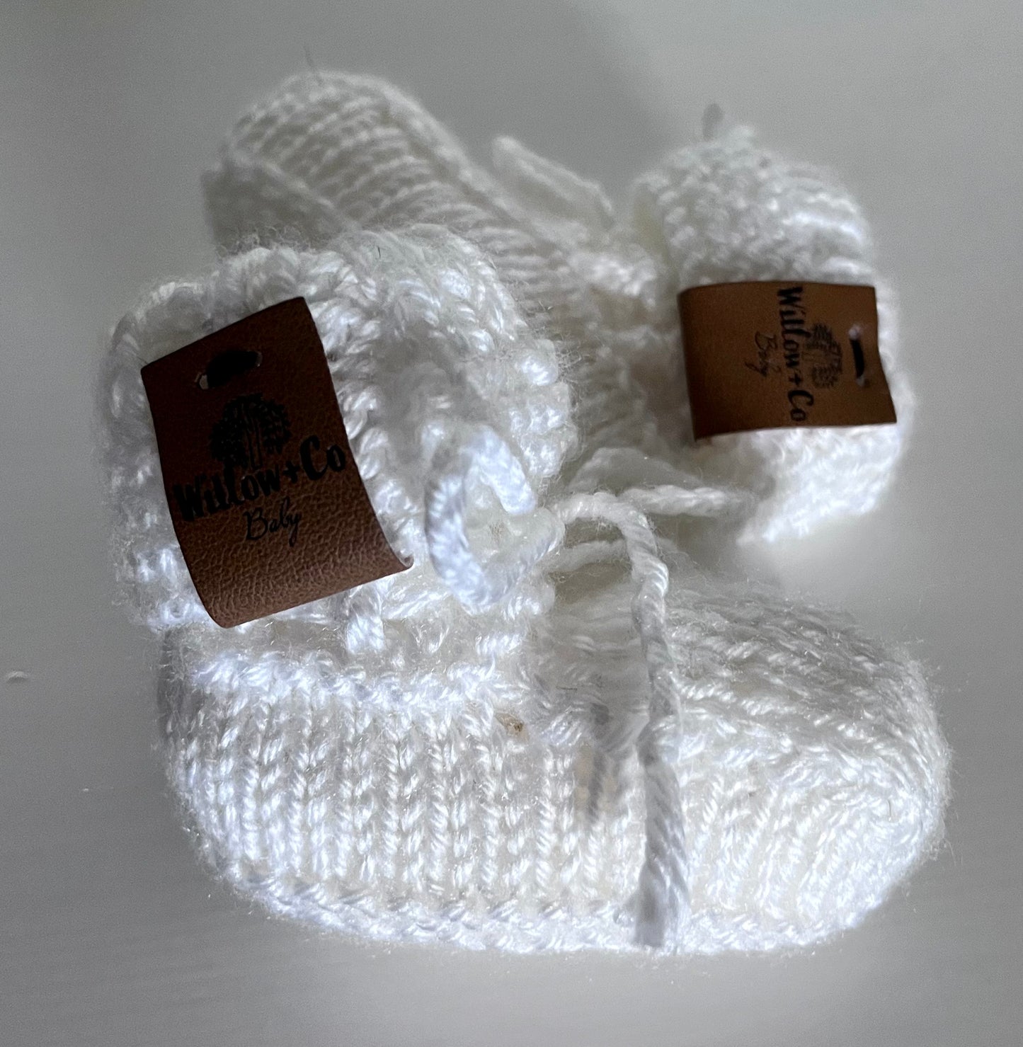 HAND KNITTED BOOTIES - MILK
